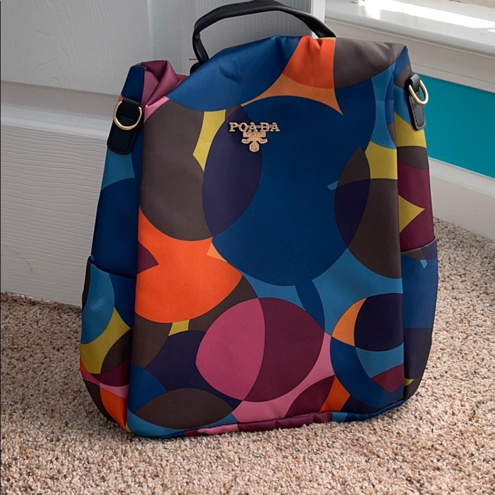 Backpack and purse strapped bag